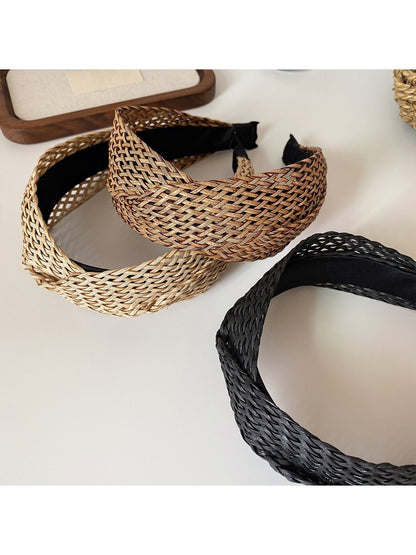 Side view of the wide bohemian headband showing fabric texture and design