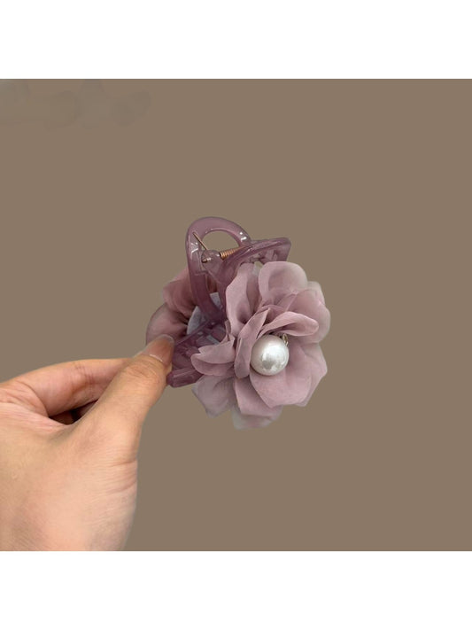 Soft purple romantic hair clip with delicate fabric petals and a metal clasp