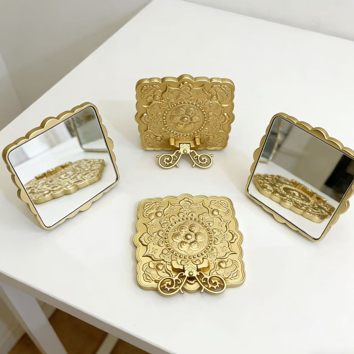 Square tabletop mirror, open and closed views