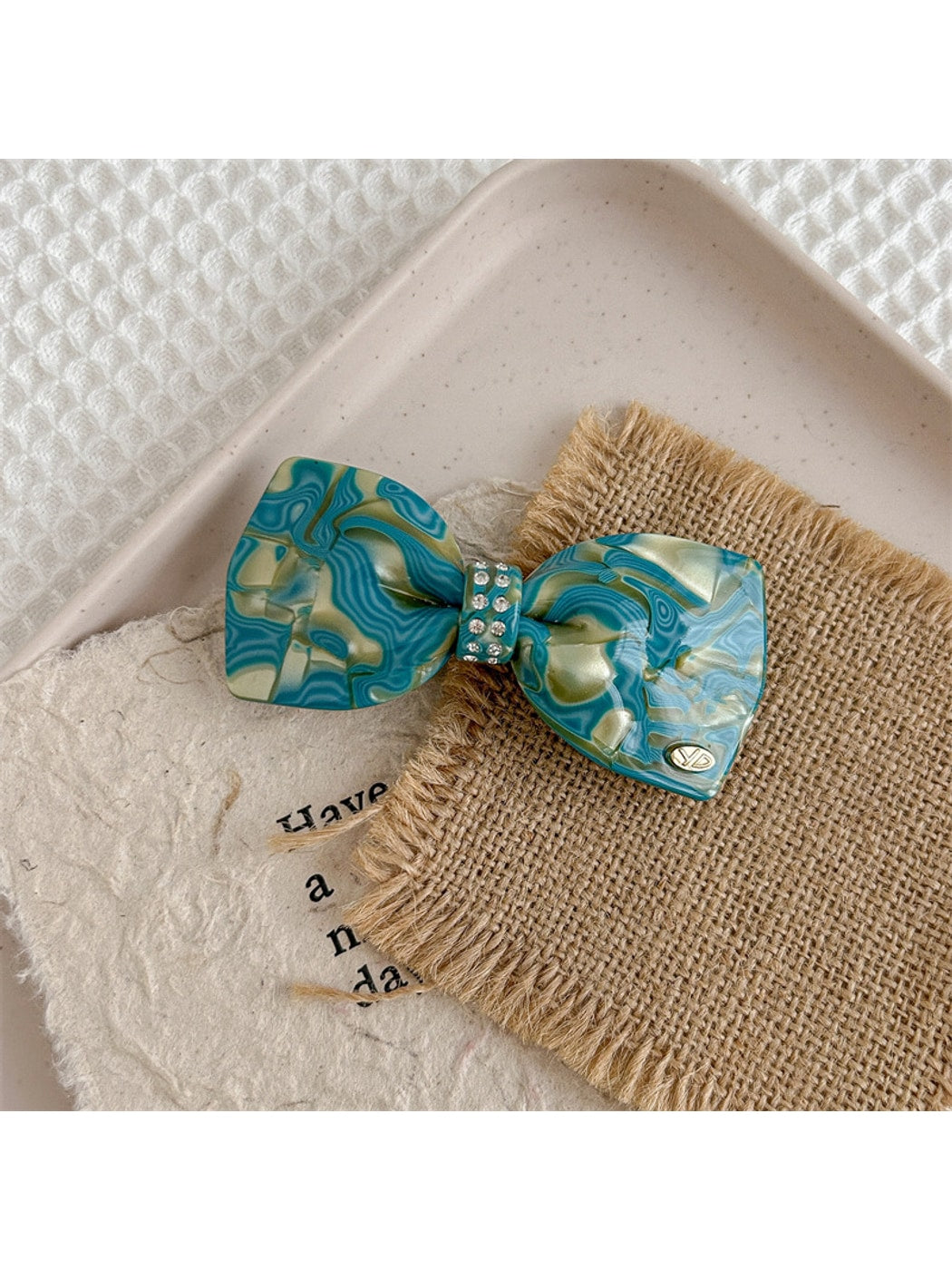 Beau - Marbled Acetate Bow Spring Hair Clip
