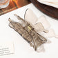 Beau Butterfly-Shaped Claw Clip with butterfly print