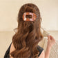 Top view of Beau flat open work shark claw clip highlighting open work design