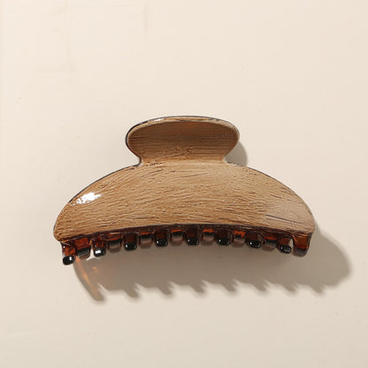 Beau - Glossy PS Curved Hollow Design Claw Clip