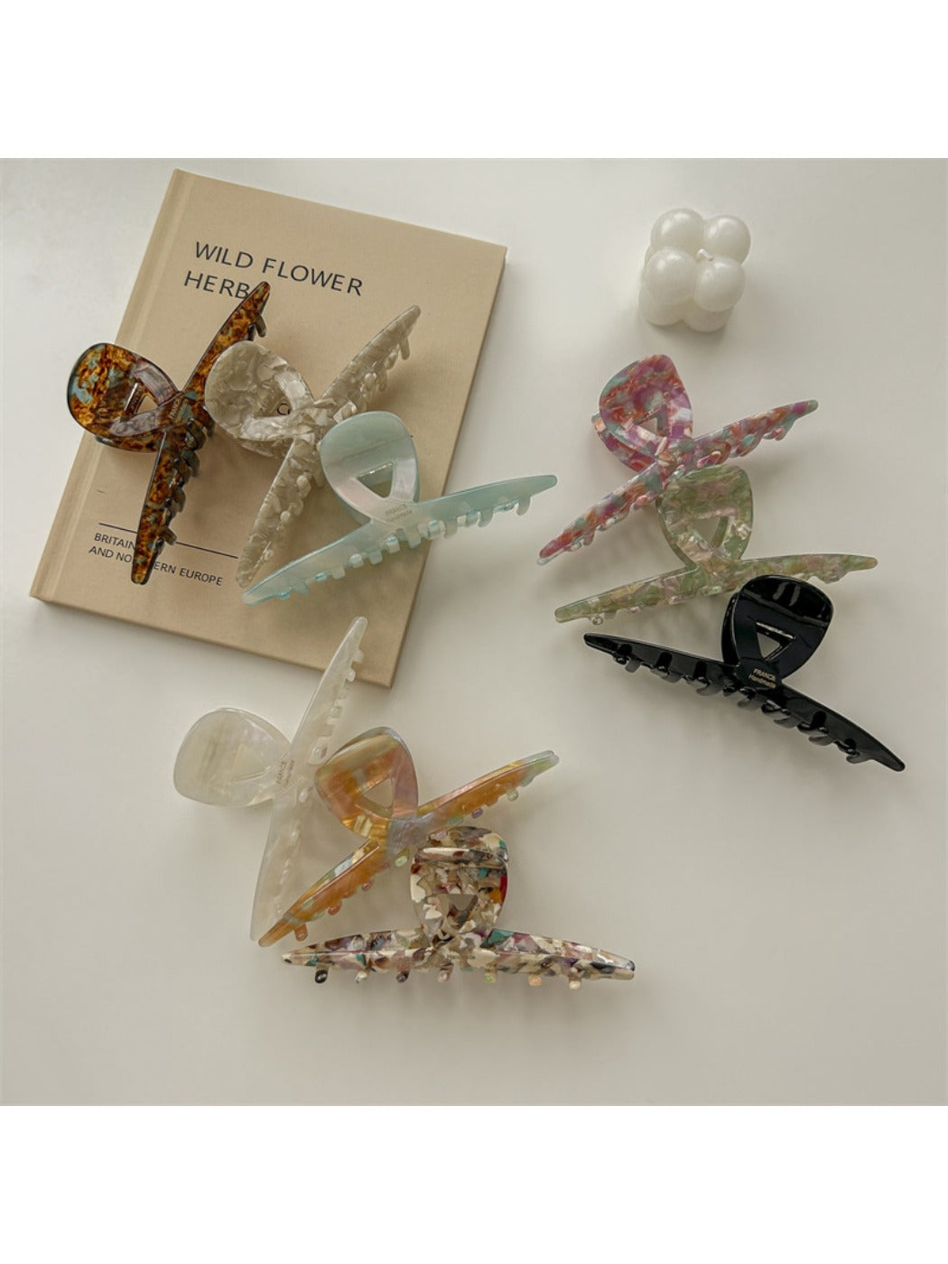 Close-up of Beau claw clip highlighting gradient color and acetate material