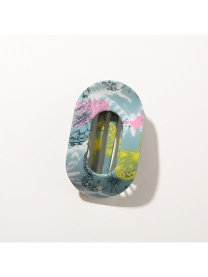 Beau hair clip angled to show both patterned front and metal clasp back