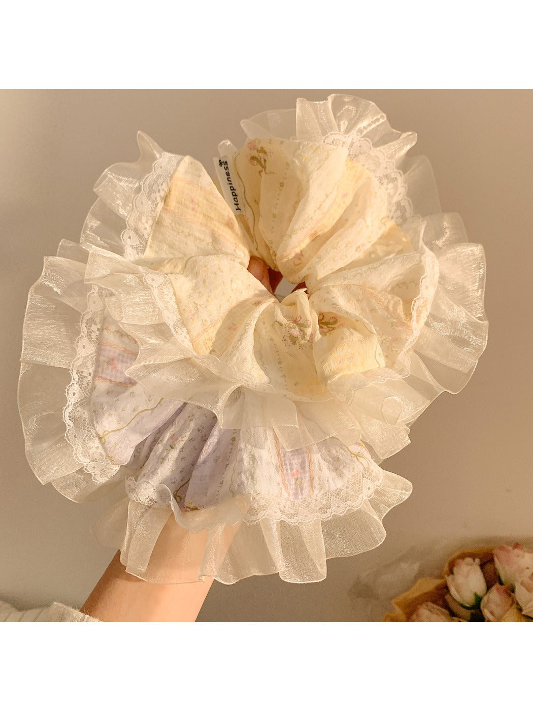 Close-up of Gifty Ditsy Floral Lace Trim Scrunchie with pink and white floral pattern