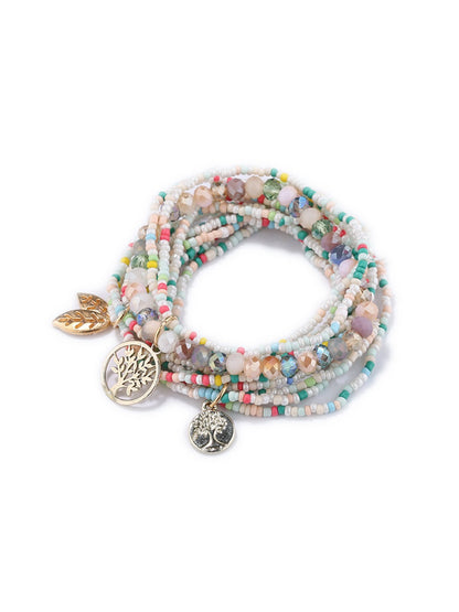 Lovra bracelet coiled to show leaf pendant and bead pattern from above