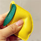 Lemon keychain placed next to a smartphone and wallet on a table