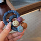 Gifty - Cute Smiley Face Hair Tie