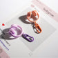 Keypus - Solid Color Headphone Shaped Keychain