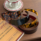Side view of Gifty wide geometric headband highlighting thickness and pattern
