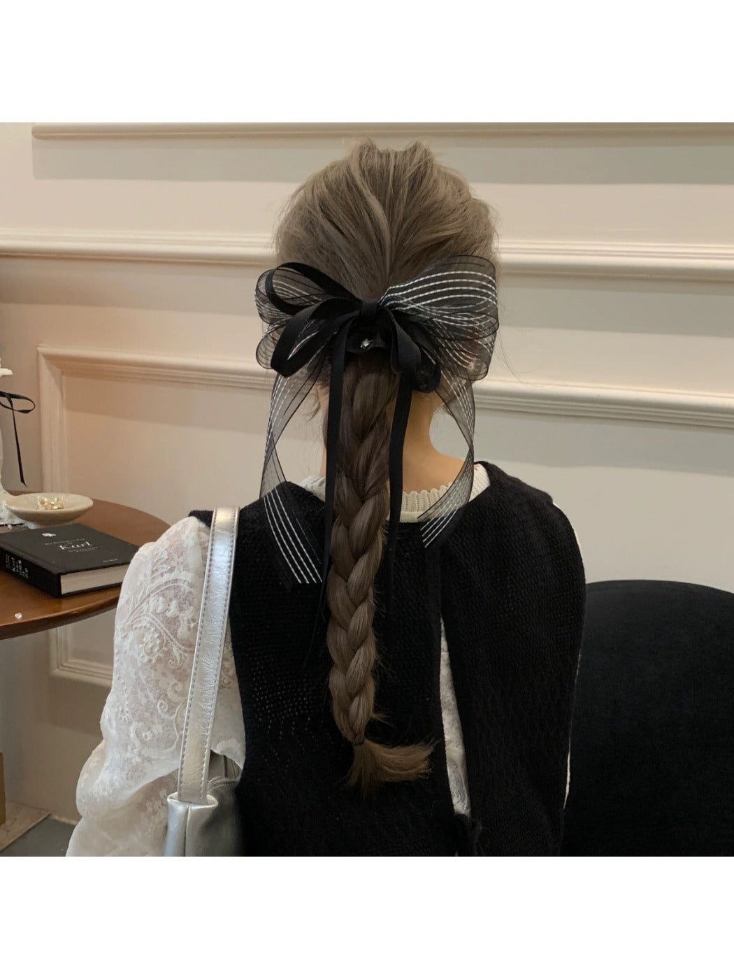 Gifty scrunchie styled on a wrist as a fashionable accessory