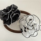 Beautiful scrunchie displayed on a white background showing fabric texture