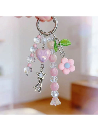 Close-up of Keypus adorable beaded heart charm keychain with colorful beads