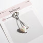 Keypus keychain displayed on a white background with soft shadows