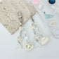 Keypus keychain charm displayed on a white background showing pearlescent finish