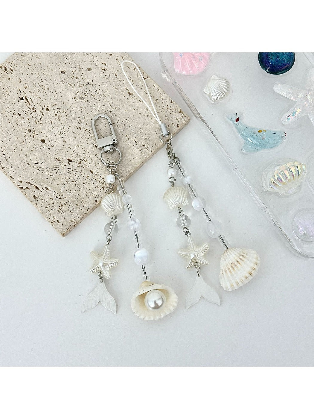 Keypus keychain charm displayed on a white background showing pearlescent finish