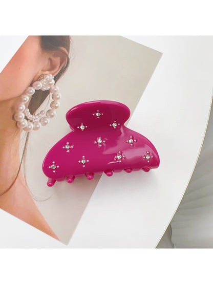 Beau chic crescent hair claw clip styled in a low bun hairstyle