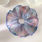 Gifty vintage scrunchie styled with casual outfit on a model