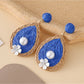 Side view of Earedge teardrop drop earrings showing clasp detail