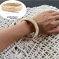 Lovra ombre bangle bracelet displayed alongside matching accessories