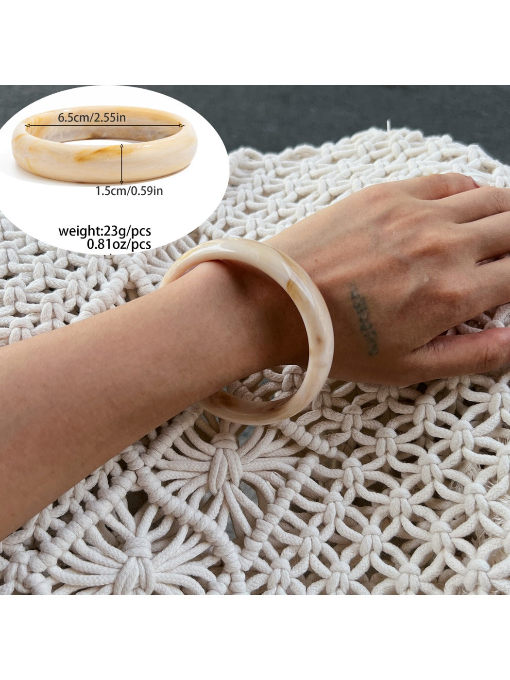 Lovra ombre bangle bracelet displayed alongside matching accessories