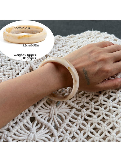 Lovra ombre bangle bracelet displayed alongside matching accessories