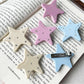 Beau acetate star-shaped hair clip on white background