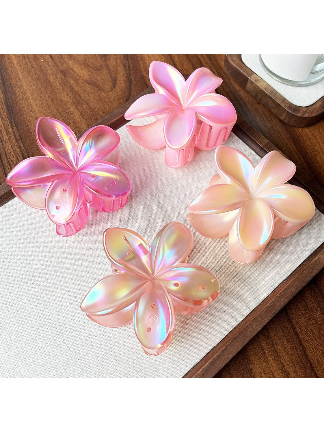 Side view of Beau flower shaped claw clip highlighting clip mechanism