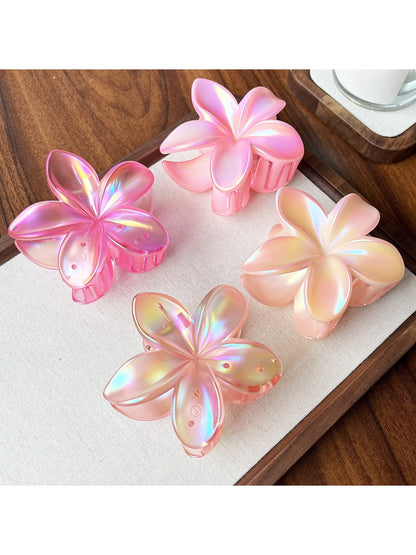 Side view of Beau flower shaped claw clip highlighting clip mechanism