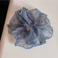 Soft pink tulle scrunchie with glitter, gathered and fluffy