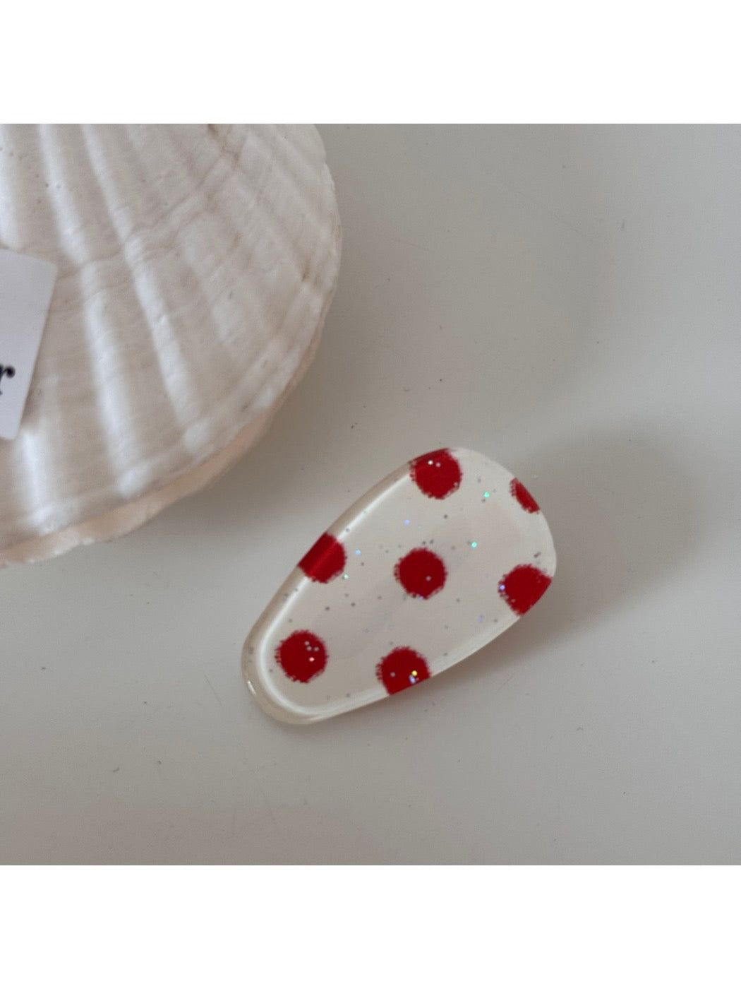 Beau hair clip photographed with soft lighting to emphasize its vintage elegance
