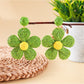 Earedge flower shaped knitted earrings in soft pink and cream colors