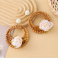 Vintage rattan woven circle earrings styled with casual outfit