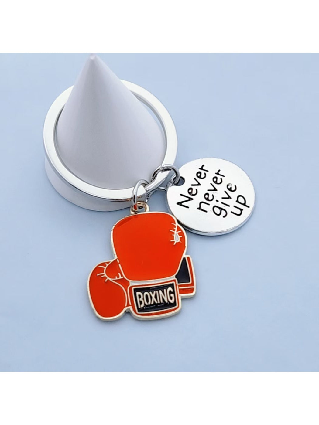 Alloy boxing glove keychain displayed on a white background