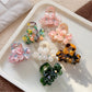 Beau vintage double flower hair claw clip in beige with intricate floral design