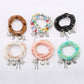 Lovra multi-row bracelet with colorful round beads on a white background