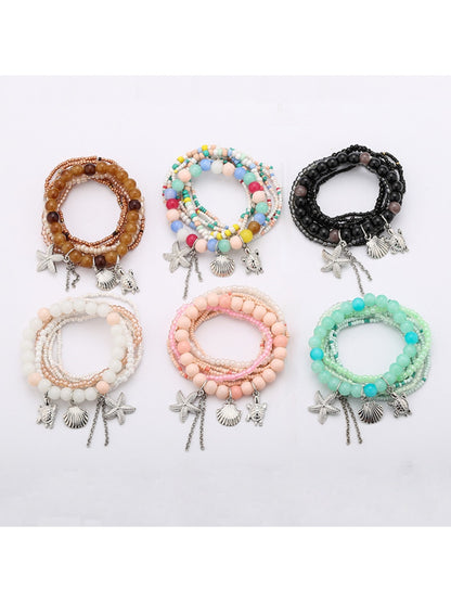 Lovra multi-row bracelet with colorful round beads on a white background