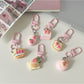 Keypus - Cartoon Strawberry Pastry Bag Charm Keychain