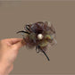 Beau charming rose-shaped fashion hair clip in soft pink with detailed petals