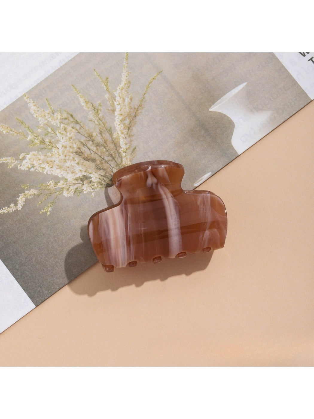 Beau Sweet Beautiful Hair Clip displayed on a wooden surface with natural lighting