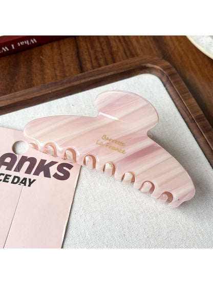 Beau elegant acetate claw clip shown from above highlighting its oval shape