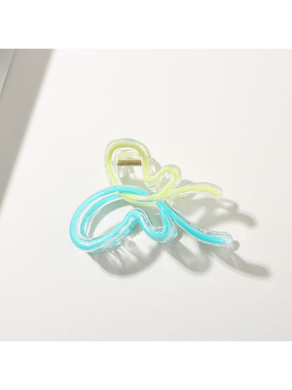 Beau butterfly hair clip displayed on white background