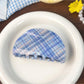Blue plaid shark hair claw clip displayed with matching accessories