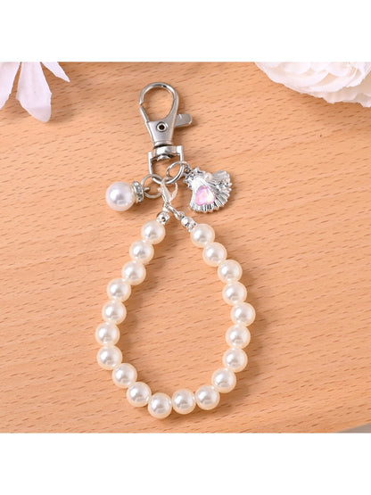 Keypus keychain with multicolored beads displayed on a white background