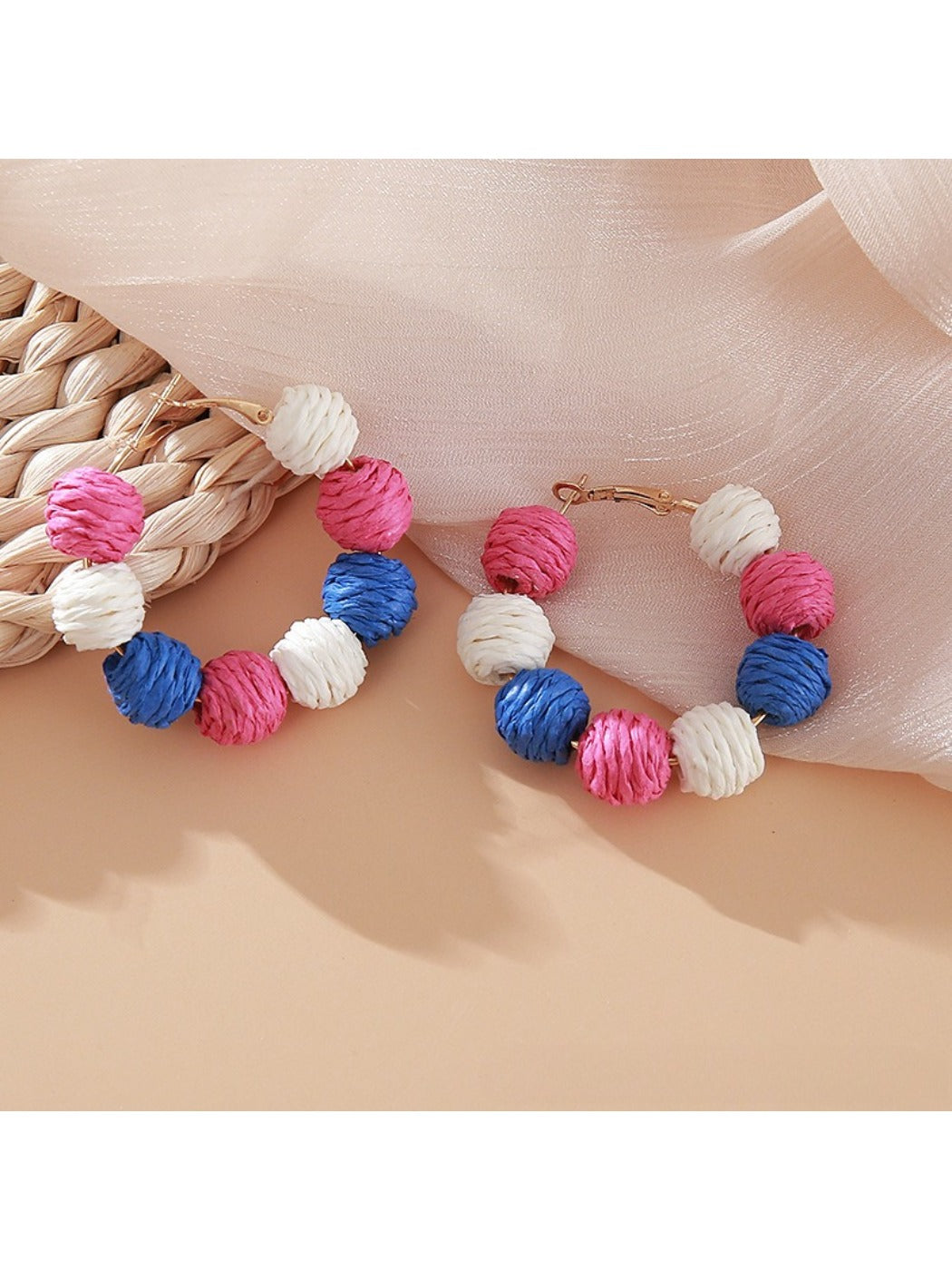 Earedge vintage raffia earrings worn by model with short hair