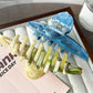 Side view of Beau minimalist large claw clip clasping hair