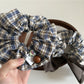 Gifty vintage plaid bow scrunchie displayed on a white background