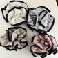 Close-up of Gifty Neat Silky Zesty Scrunchie showing smooth silky texture
