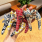 Back view of Keypus cartoon cat charm keychain with smooth surface and attached keyring